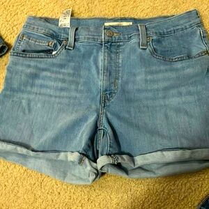 EC lighter blue jean shorts made by Levi’s